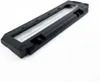 A black plastic cover with a clear plastic tube inside, shown on a white background. Produktbild-Vorschau