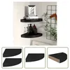 A collage of images showing black corner shelves, including a lifestyle shot with decorative items and close-ups of the shelves. Produktbild-Vorschau