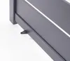 Close-up of the bottom corner of a gray garden gate, showing a small black plastic foot. Produktbild-Vorschau