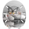 A toilet seat with a butterfly and stone design. Náhľad obrázku produktu