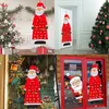 A collage of four images showing Christmas-themed advent calendars shaped like Santa Claus, displayed in various settings. Produktbild-Vorschau