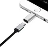 A close-up shot of a USB-C to Apple adapter and cable, with the adapter plugged into an iPhone. Produktbild-Vorschau