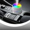 A car's interior console with a humidifier and air freshener. Produktbild-Vorschau