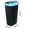 A black trash can with a blue lid and dimensions indicated by text. Produktbild-Vorschau