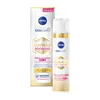 A product shot of NIVEA Cellular LUMINOUS 630 Anti-Pigment Spots Day Care Fluid SPF 50, with its packaging. Produktbild-Vorschau