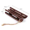 A miniature wooden sled with dimensions indicated by measurement lines and text. Produktbild-Vorschau