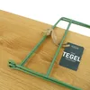 A close-up of a green metal shelf bracket tied with twine, resting on a wooden surface. Produktbild-Vorschau