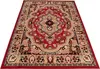 A red oriental rug with intricate patterns is shown from a diagonal angle on a white background. Anteprima dell’immagine prodotto