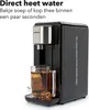 A black hot water dispenser with a glass mug filled with tea. Produktbild-Vorschau