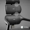 Close-up of a black ergonomic office chair, highlighting its headrest and backrest with circular overlays and lines indicating airflow. Náhled obrázku produktu
