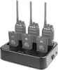 A black multi-charger base with three walkie-talkies and three batteries inserted, shown on a white background. Anteprima dell’immagine prodotto
