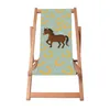 A wooden deck chair with a fabric seat featuring a cartoon horse and horseshoe pattern. Podgląd zdjęcia produktu