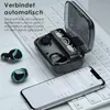 A pair of wireless earbuds and their charging case are placed on a keyboard next to a smartphone. Produktbild-Vorschau