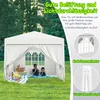 A white party tent set up on a grassy lawn with two children inside. Produktbild-Vorschau