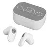 A white charging case for wireless earbuds is shown with two white earbuds placed in front of it. The charging case has a digital display showing '188' and indicators for 'LO' and 'OR'. Voir les images du produit