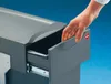 A hand is shown pulling out a drawer from a dark gray waste bin. Produktbild-Vorschau