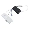 A black receiver box and a white remote control for a ceiling fan are shown against a white background. Podgląd zdjęcia produktu