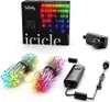 A product shot of Twinkly LED icicle lights and their packaging, along with a power adapter. Náhled obrázku produktu
