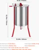 A stainless steel honey extractor with red metal legs and crank, with dimensions indicated by measurement lines and text. Anteprima dell’immagine prodotto