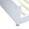 Close-up view of the side and leg of a white upholstered bed frame. Produktbild-Vorschau