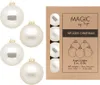 A product shot of white Christmas ornaments next to their packaging. Produktbild-Vorschau