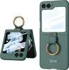 A product shot of a green flip phone case with a gold ring holder, shown in two configurations: folded and unfolded. Produktbild-Vorschau