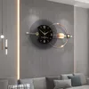 A modern living room with a large decorative wall clock as the centerpiece. Anteprima dell’immagine prodotto