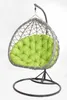 A hanging egg chair with a bright green cushion, shown against a white background. Podgląd zdjęcia produktu