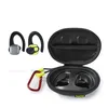A pair of black and yellow wireless earbuds with a charging case and a carabiner clip, all set against a white background. Anteprima dell’immagine prodotto
