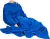 A person wearing a blue fleece blanket with sleeves, sitting and draped in the blanket. Náhľad obrázku produktu