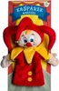 A puppet of a jester character is presented on a cardboard backing with circus-themed graphics. Voir les images du produit