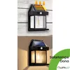 A collage showing a solar wall lamp in two different settings: one during the day with sun arrows indicating charging, and one at night with the lamp illuminated. Produktbild-Vorschau
