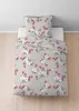 A floral patterned duvet cover and pillow set laid out on a bed. Produktbild-Vorschau