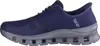 Side view of a blue and gray Skechers slip-in shoe against a white background. Anteprima dell’immagine prodotto