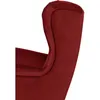 Close-up side view of a red velvet wingback armchair. Náhled obrázku produktu
