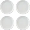 Four white plates arranged in a 2x2 grid on a white background. Produktbild-Vorschau
