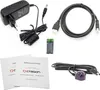 A collection of electronic accessories including a power adapter, HDMI cable, batteries, IR receiver, and user manuals, arranged on a white background. Produktbild-Vorschau