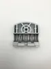 A close-up, top-down view of a metal part against a white background. Produktbild-Vorschau
