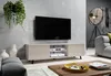 A modern living room with a TV stand, TV, sofa, and lamp. Produktbild-Vorschau