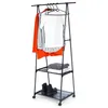 A black metal garment rack with clothes hanging on it and folded items on shelves. Anteprima dell’immagine prodotto