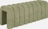 A green upholstered bench with a curved, segmented design. Produktbild-Vorschau