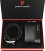 A gift set containing a black leather wallet and a black leather belt, presented in a black gift box with red trim. The box lid features the Pierre Cardin logo and brand name. Voir les images du produit