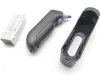 A disassembled Braun ThermoScan 7 ear thermometer and its packaging are laid out on a white surface. Produktbild-Vorschau