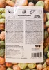 A close-up of a bag of mixed snacks with a label showing product information. Produktbild-Vorschau