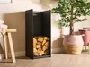 A modern living room with a black firewood rack filled with logs, a potted plant, and a stool with blankets. Anteprima dell’immagine prodotto