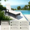 A rattan sun lounger is placed by a swimming pool with a view of the ocean. Náhled obrázku produktu