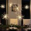 A dining table set for a festive occasion with starburst LED lights as centerpieces. Produktbild-Vorschau