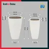 Two white ceramic planters with dimensions indicated by measurement lines and text. Náhľad obrázku produktu
