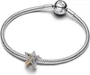 A close-up studio shot of a Pandora bracelet with a charm. Podgląd zdjęcia produktu