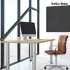 A modern office desk setup with a computer, chair, and a large window. Voir les images du produit